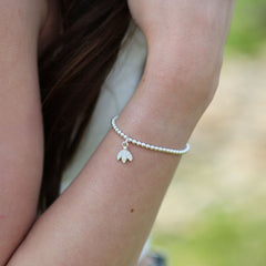 Snowdrop Stretch Bracelet in Crystal Enamel by Sheila Fleet