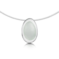 This Shoreline Pebble necklace in sterling silver features a single silver pebble shape measuring approximately 16mm by 21mm, delicately hanging from a sterling silver neckwire.