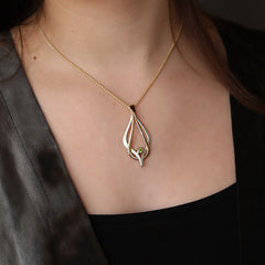 Reef Knot Peridot Dress Pendant in 9ct White & Yellow Gold by Sheila Fleet Jewellery