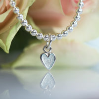 Secret Hearts Petite Stretch Bracelet in Frost Enamel by Sheila Fleet Jewellery