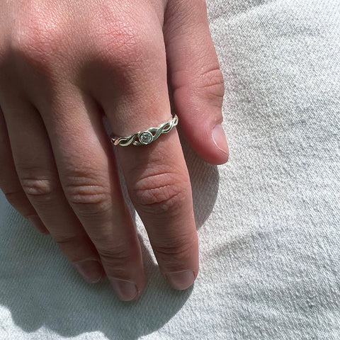 Celtic Twist 0.09ct Diamond Solitaire Ring in Platinum