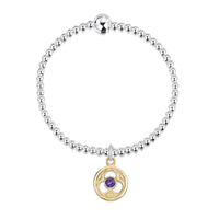 Celtic Trinity Silver Stretch Bracelet with 9ct Yellow Gold & Amethyst Charm by Sheila Fleet Jewellery