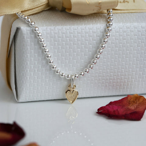 Secret Hearts Stretch Bracelet with 9ct Yellow Gold Charm by Sheila Fleet Jewellery