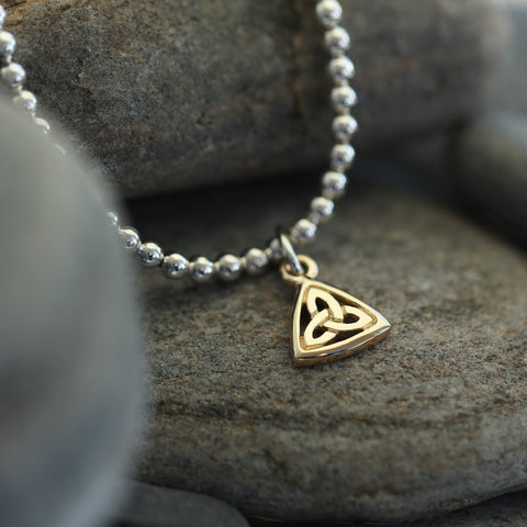Book of Kells Silver Stretch Bracelet with 9ct Yellow Gold Small Charm by Sheila Fleet Jewellery