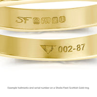 Example hallmarks and serial number on a Sheila Fleet Scottish Gold ring.