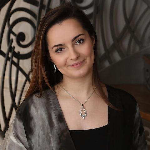 Reef Knot Blue Topaz Dress Pendant Necklace