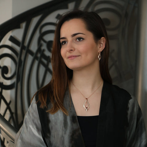 Reef Knot Garnet Dress Pendant in 9ct White & Rose Gold