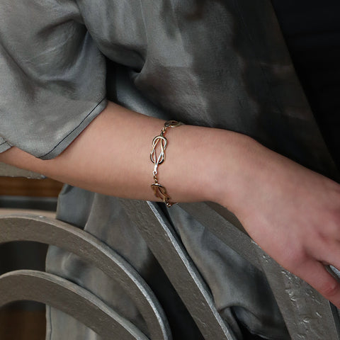 Reef Knot Bracelet in 9ct White and Yellow Gold
